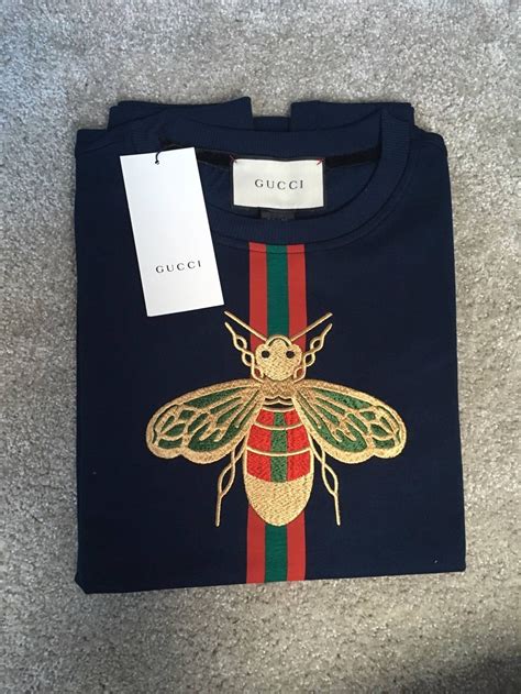 gucci bee logo shirt|Gucci bee embroidered sweater.